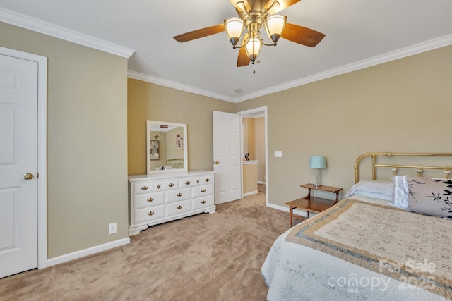 carpeted bedroom with ceiling fan, baseboards, and ornamental molding