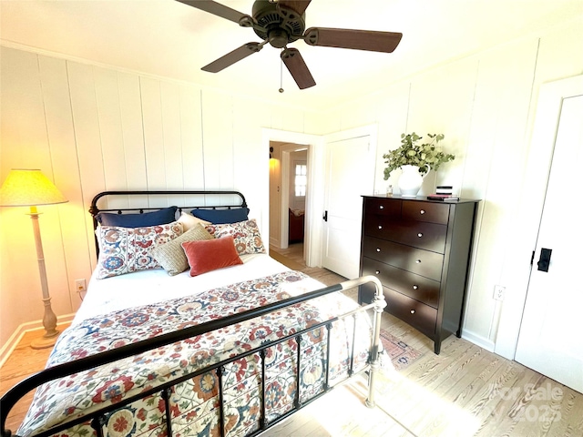 bedroom featuring ceiling fan and light wood-type flooring