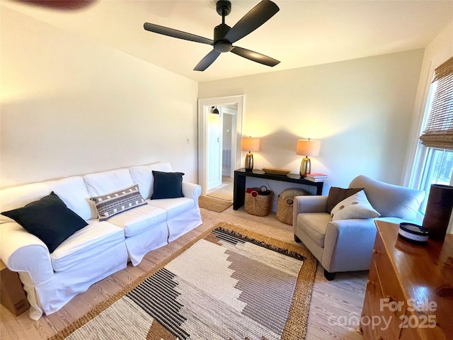 living room with ceiling fan