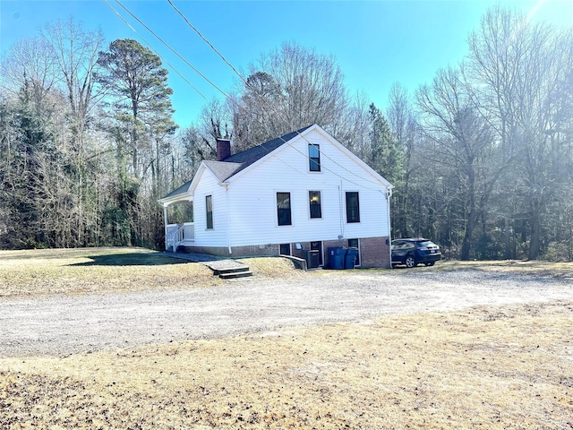 view of side of property with cooling unit