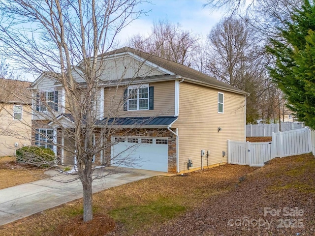 view of front of home with a garage