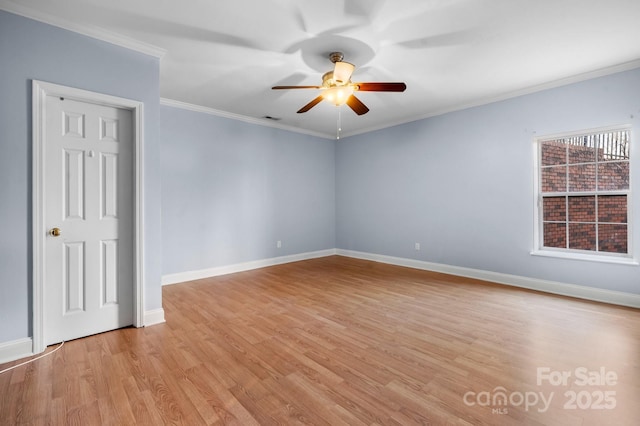 unfurnished room with crown molding, light hardwood / wood-style flooring, and ceiling fan