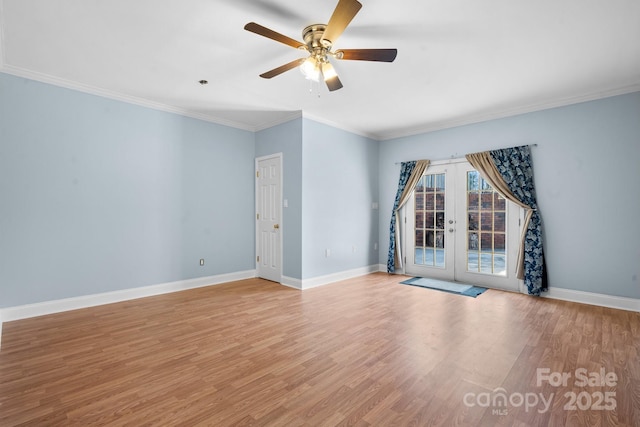 unfurnished room featuring crown molding, french doors, ceiling fan, and light wood-type flooring