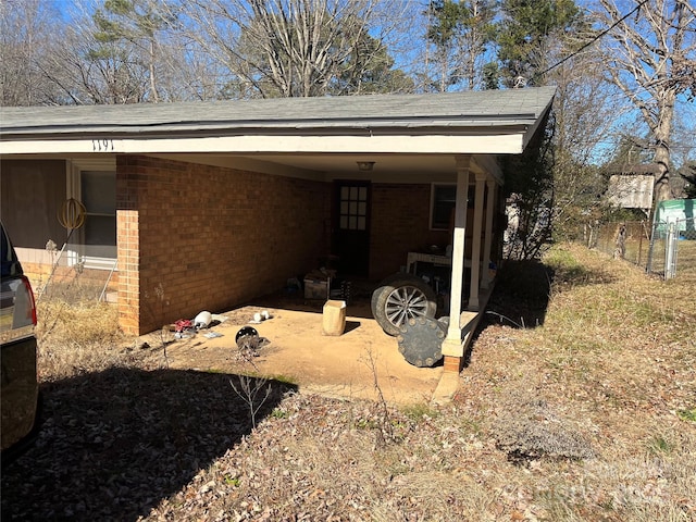 view of parking / parking lot with a carport