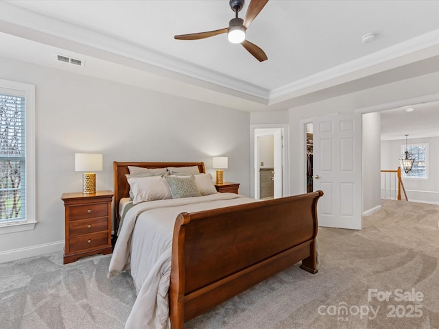 bedroom with crown molding, ceiling fan, and multiple windows