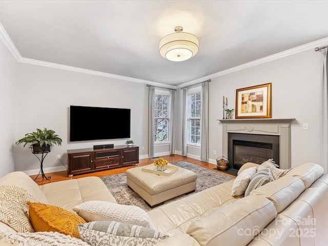 living room with ornamental molding and light wood-type flooring