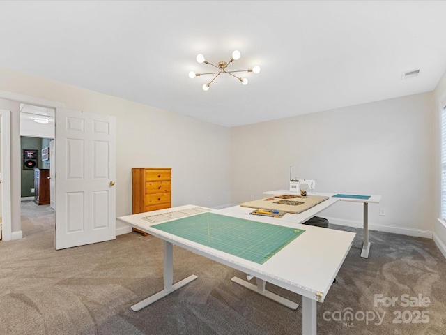 dining room with an inviting chandelier and carpet flooring