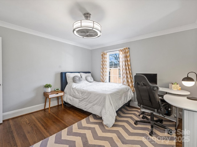 bedroom featuring ornamental molding and dark hardwood / wood-style floors