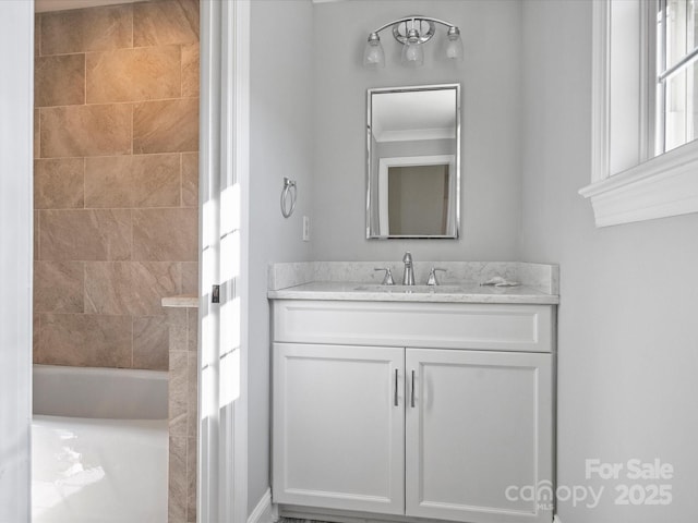 bathroom with vanity and bathing tub / shower combination