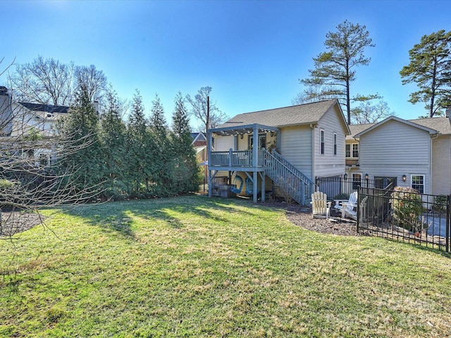 view of yard with a pergola and a wooden deck