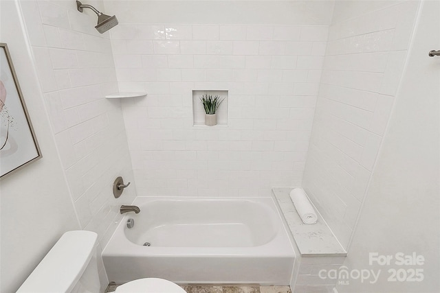 bathroom with shower / bath combination and toilet