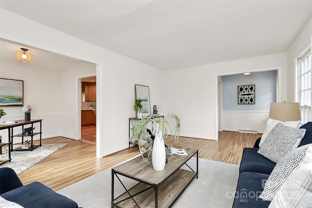 3828 Chandworth Rd, Charlotte, NC 28210 - living area featuring wood finished floors and baseboards