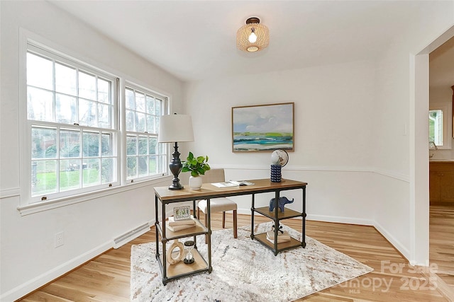 3828 Chandworth Rd, Charlotte, NC 28210 - home office with light wood-style flooring and baseboards