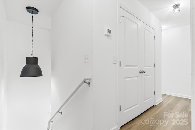 hallway featuring light wood-type flooring