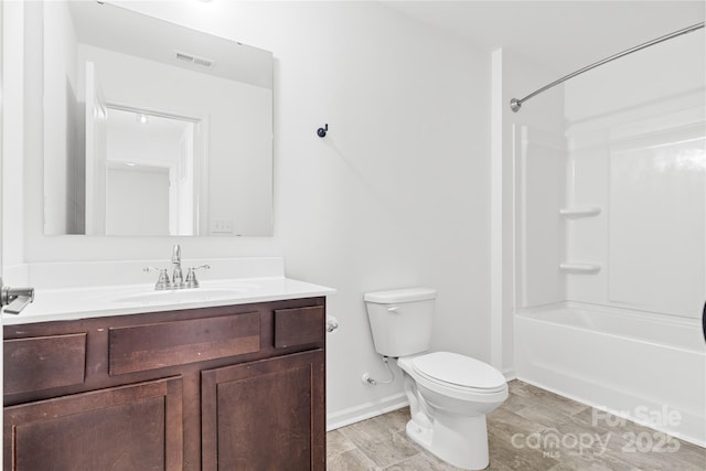 full bathroom with tub / shower combination, toilet, and vanity