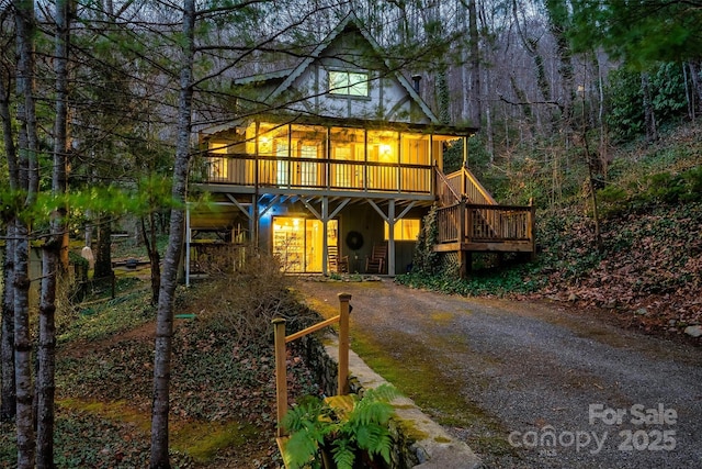 view of front of house featuring a wooden deck