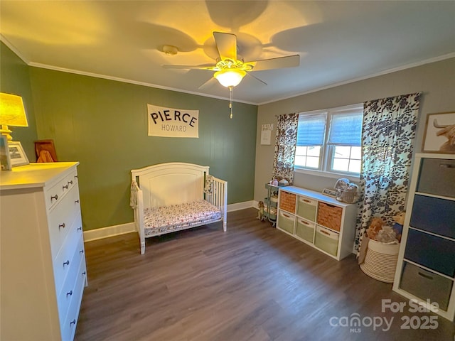 bedroom with dark wood-style floors, ceiling fan, baseboards, and crown molding