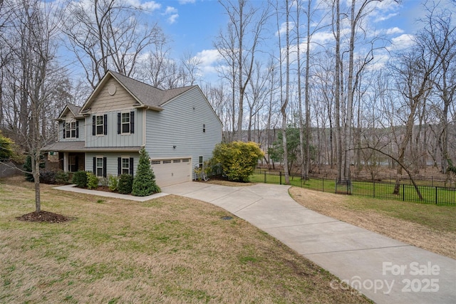 view of property exterior with a garage and a yard