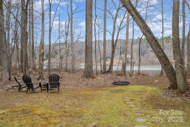 view of yard with a water view