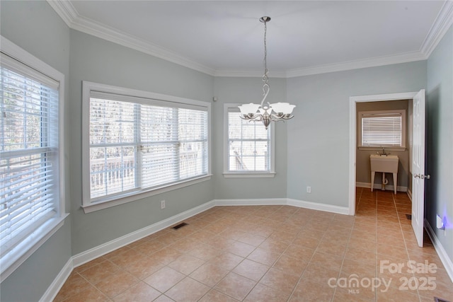 tiled spare room featuring sink, a healthy amount of sunlight, crown molding, and an inviting chandelier