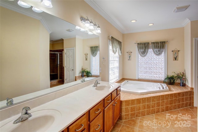 bathroom featuring crown molding, tile patterned flooring, shower with separate bathtub, and vanity