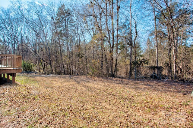 view of yard with a wooden deck