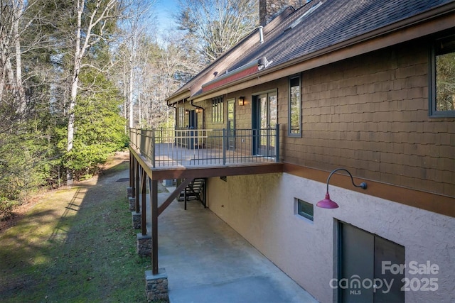 exterior space with a wooden deck