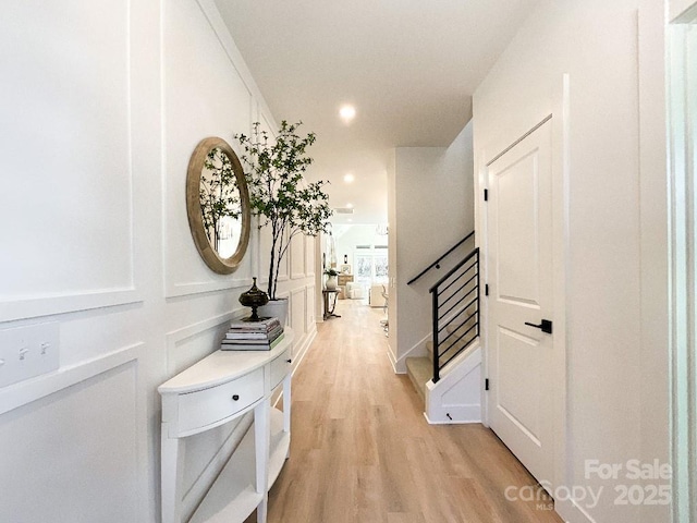 hall featuring light hardwood / wood-style floors