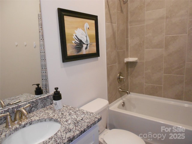 bathroom featuring toilet, shower / tub combination, and vanity