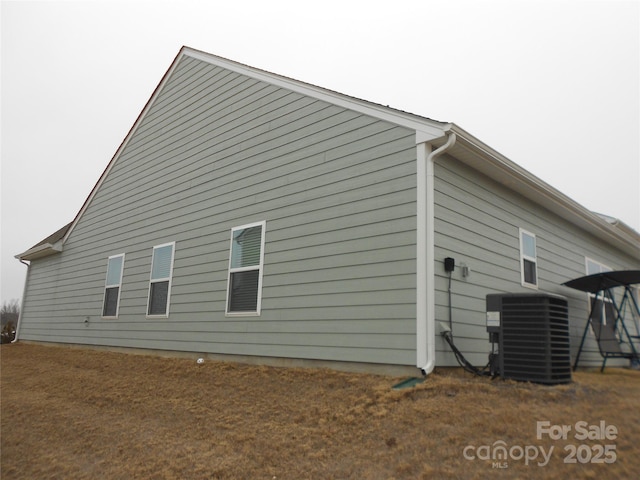 view of property exterior with central air condition unit