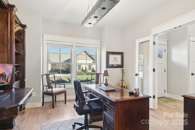 office space featuring light hardwood / wood-style floors