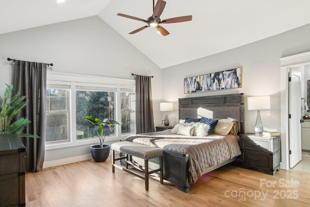 bedroom featuring ceiling fan, high vaulted ceiling, and light hardwood / wood-style floors