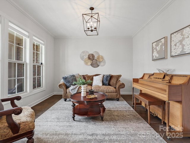 sitting room featuring crown molding, dark hardwood / wood-style floors, and a chandelier