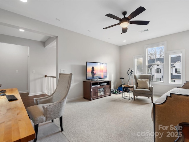 home office with ceiling fan and carpet floors