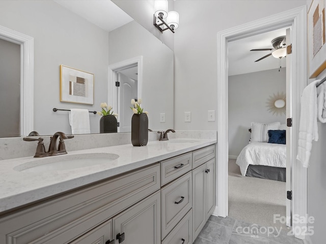 bathroom featuring vanity and ceiling fan