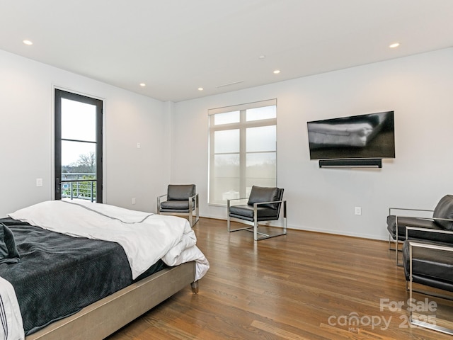 bedroom featuring hardwood / wood-style floors