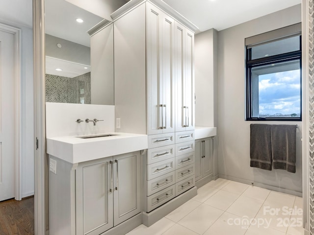 bathroom featuring vanity and tile patterned flooring