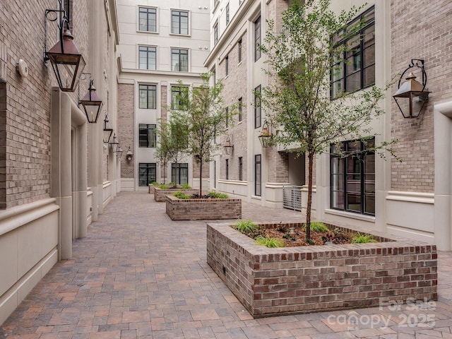 view of property's community with a patio