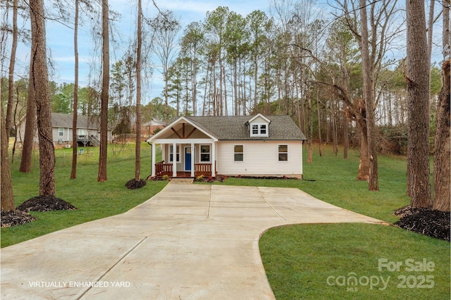 view of front of property with a porch and a front yard