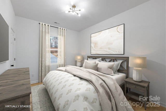 bedroom featuring hardwood / wood-style flooring