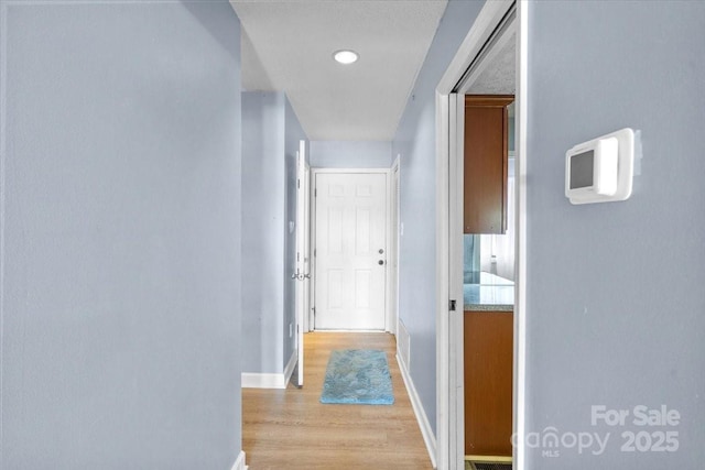 hall featuring light hardwood / wood-style floors