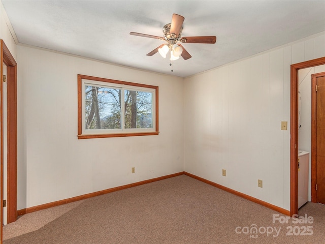 unfurnished room featuring washer / clothes dryer, carpet floors, and ceiling fan