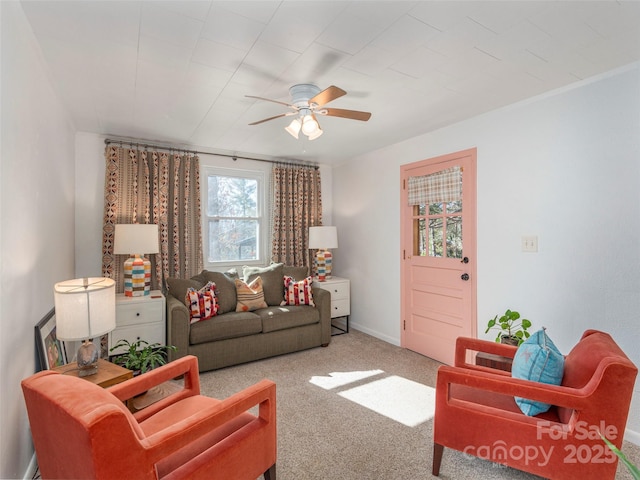 living room with light colored carpet and ceiling fan