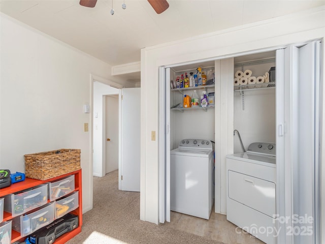 clothes washing area with light carpet, independent washer and dryer, and ceiling fan