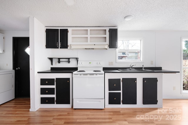 kitchen with sink, white electric range, washer / clothes dryer, and a healthy amount of sunlight