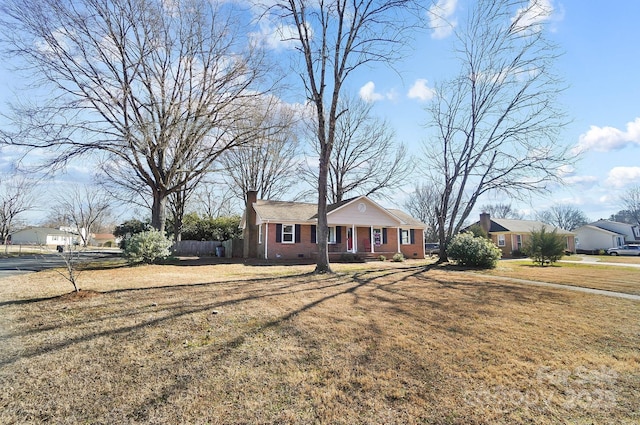 view of front of home with a front yard