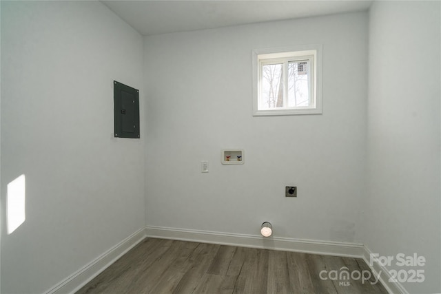 laundry room with electric panel, dark hardwood / wood-style flooring, hookup for a washing machine, and hookup for an electric dryer