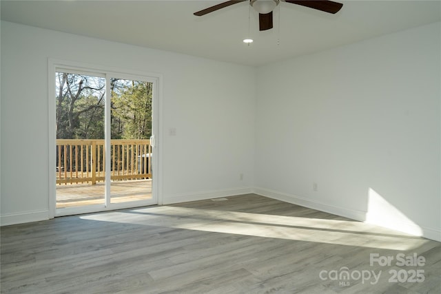 unfurnished room featuring light hardwood / wood-style floors