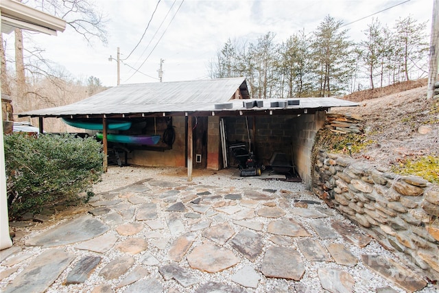 view of patio featuring a carport