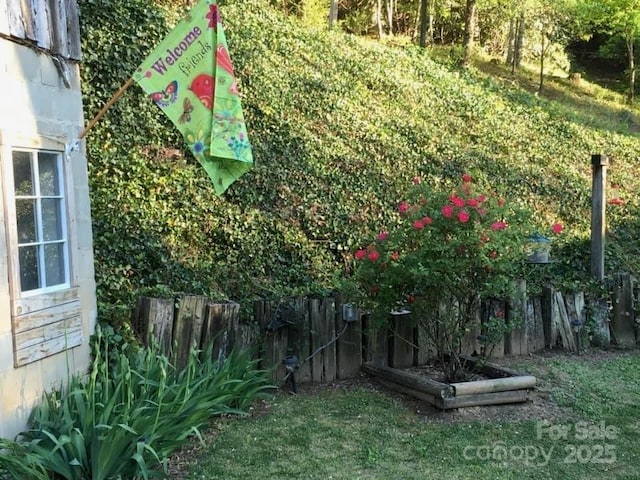 view of yard with fence